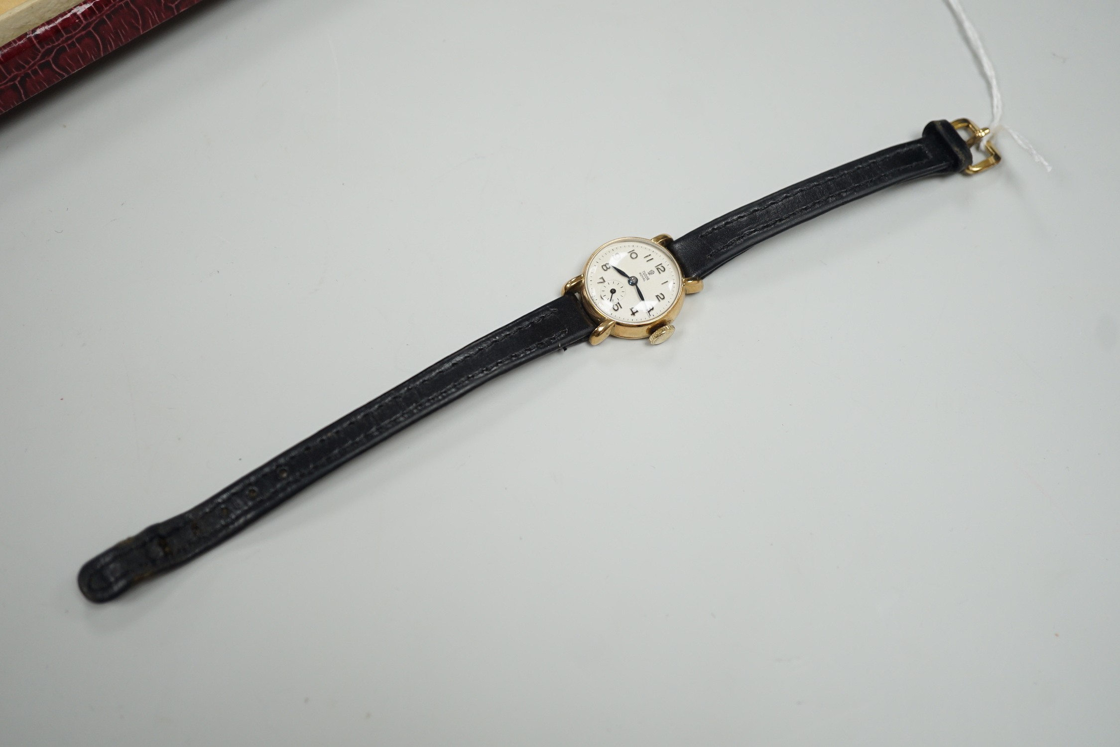 A lady's 1950's 9ct gold Tudor Royal manual wind wrist watch, with Arabic dial and subsidiary seconds, on associated leather strap, case diameter 20mm, with Tudor box.